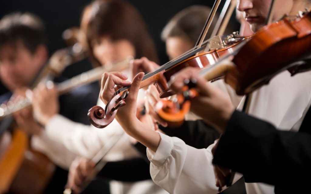 A violin being played in an orchestra
